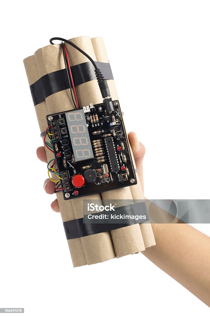 Mão segurando bomba-relógio - Foto de stock de Armamento royalty-free