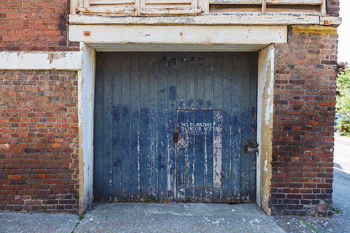 The doors and windows are blue