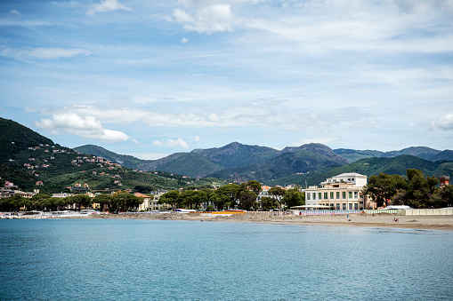 The Ligurian coast on the Mediterranean near the small town of Sestri Levante with its urban beach. The small town between Genoa and the Cinque Terre impresses with its lovingly painted colourful houses and the enchanting bay with its small harbour.