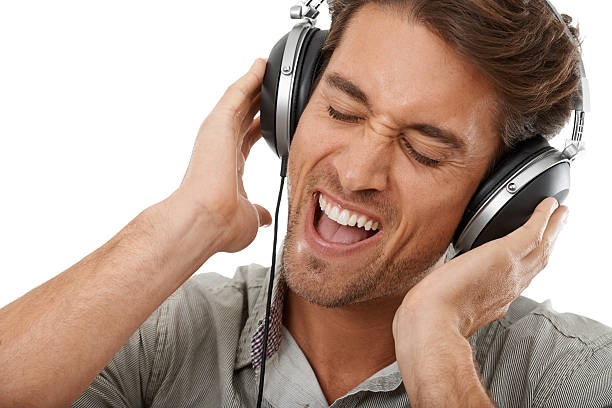 istock Singing along with his favourite song 186693125