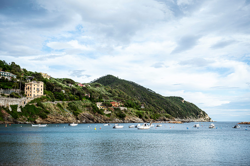 View of the Bay of Silence in the small town of Sestri Levante on the Ligurian coast. The small town between Genoa and the Cinque Terre impresses with its lovingly painted colourful houses and the enchanting bay with its small harbour.