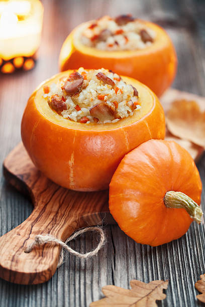 Roasted stuffed pumpkins stock photo