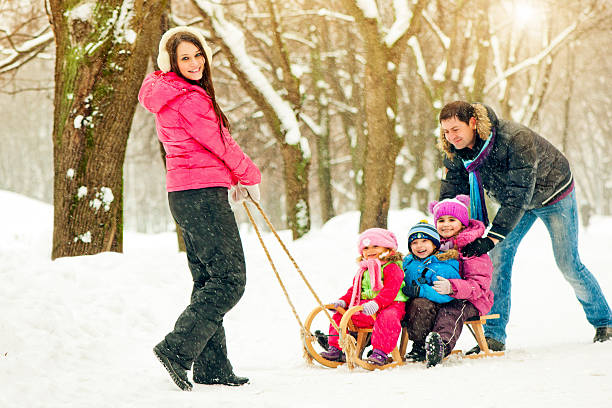istock Family in a winter park 186695878