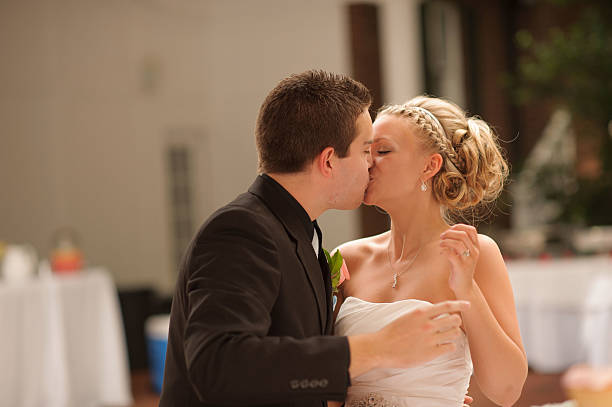 istock Groom and Bride Kissing 186696178