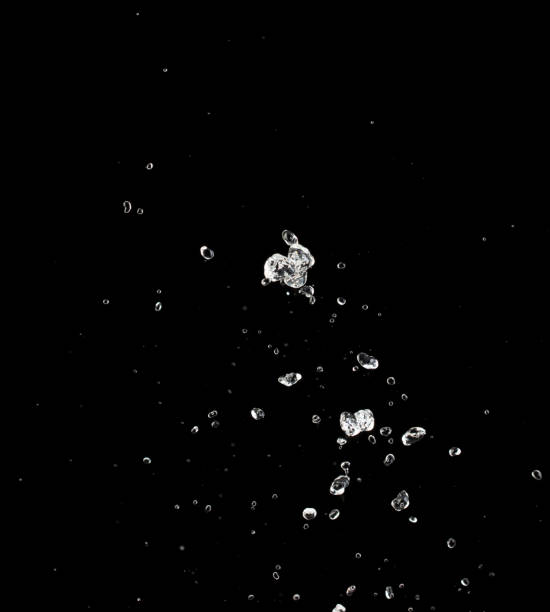 istock Shape form throw of Water splashes into drop water attack fluttering in air and stop motion freeze shot. Splash Water for explosion texture graphic resource elements, black background isolated 1866962780