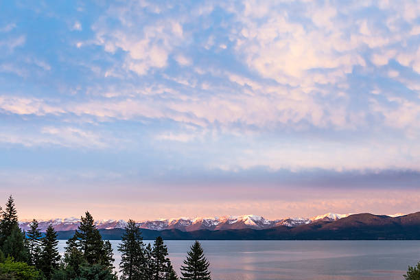 Pink and blue sunset sky over Flathead Lake in Montana.