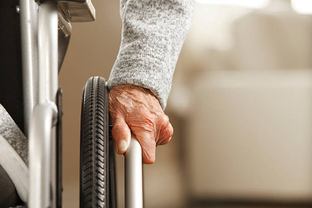 istock Senior In Wheelchair 186697258