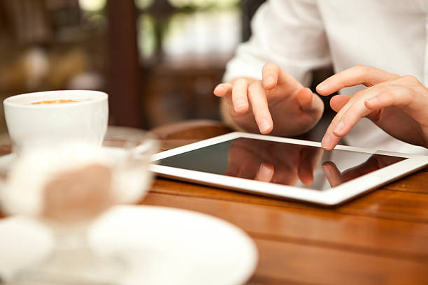 istock Businesswoman uses digital tablet 186697380