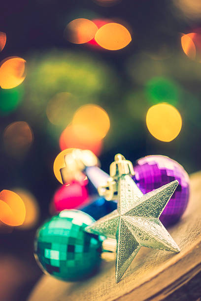 istock Bright Christmas Ornaments in Front of Tree 186697391