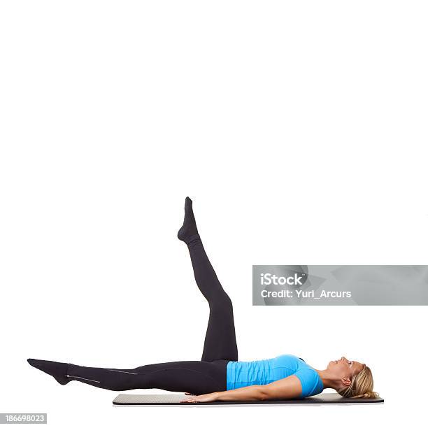 Perfekte Form Stockfoto und mehr Bilder von Pilates-Methode - Pilates-Methode, Yoga, Auf dem Rücken liegen