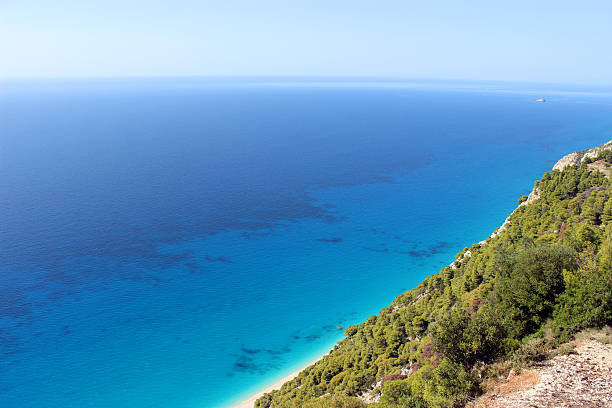 Mountain and blue ocean in Egremni Beach - Lefkada (Greece) Absolutely amazing! egremni beach lefkada island greece stock pictures, royalty-free photos & images