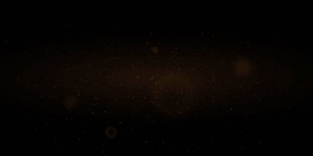 istock Golden glitter. Flare light effect. Shiny background of particles and light. 1867018924