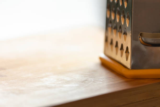 Close-Up Grater on Wooden Board