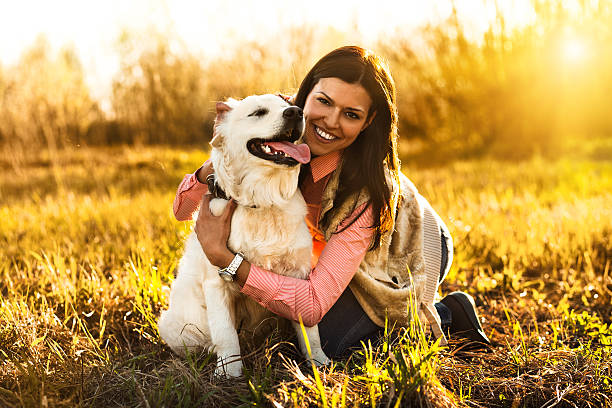 istock woman with dog 186703063
