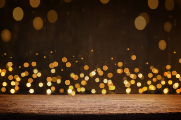 istock Empty rustic wooden table with blurred glitter lights background. Christmas lights on empty wooden table. Xmas holidays wallpaper. 1867034166