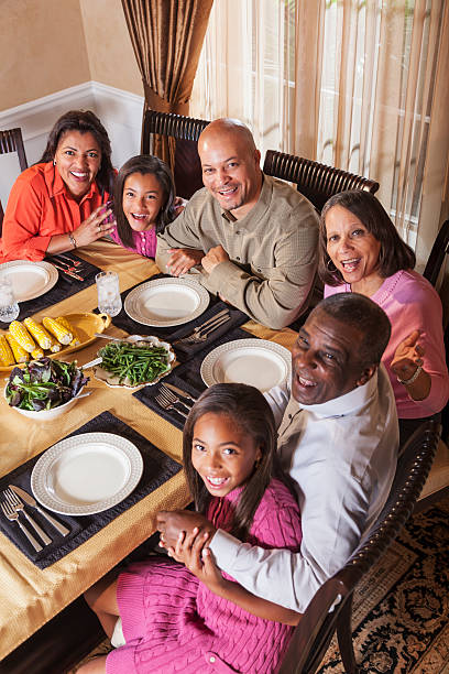 istock Multi-generation African American family dinner gathering 186703860