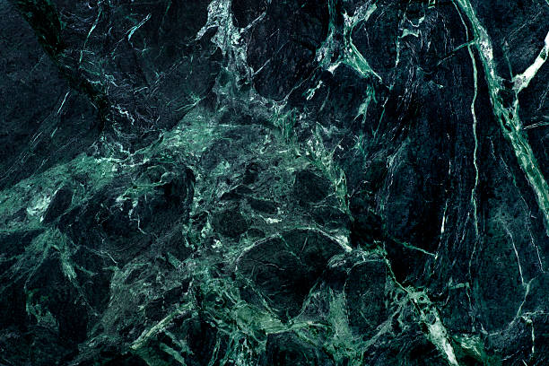 This is an overhead photo of a green marble background.