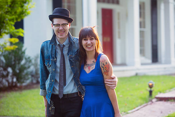 istock Happy Hipster Couple with House 186705445