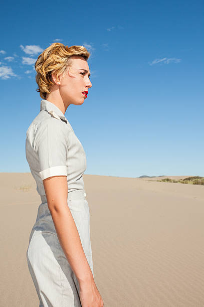 istock Pretty Woman in a WWII Nurses Uniform 186705984