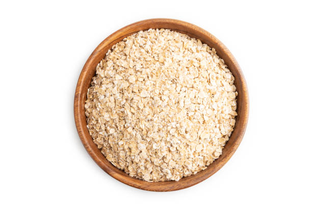 istock oatmeal isolated on white background, top view 1867063367