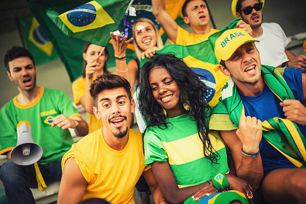 istock Group of brazilian supporters at stadium 186707741