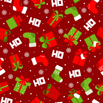 Seamless background with typography Ho ho ho pattern design with red background and gift boxes.