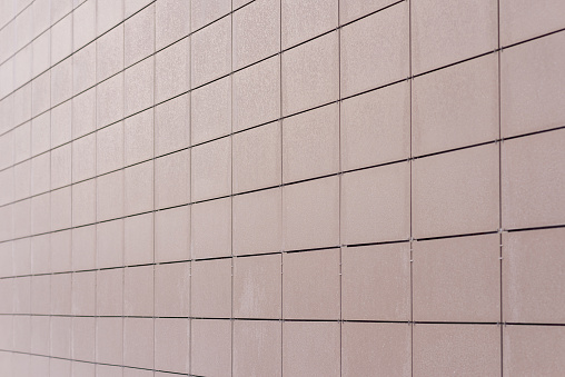 Block Wall. Stylish and Strong Blockwork. Protective Structure. New Block, brown Blockwall Texture.