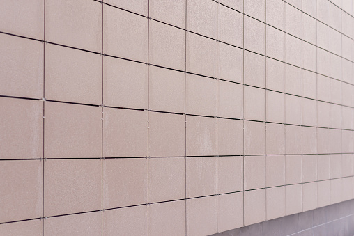 Block Wall. Stylish and Strong Blockwork. Protective Structure. New Block, brown Blockwall Texture.