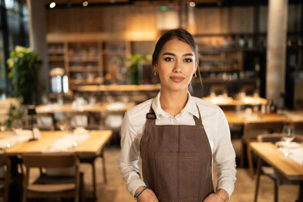 istock Beautiful waitress in restaurant 1867102075