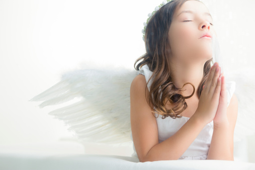 7 years old girl angel praying
