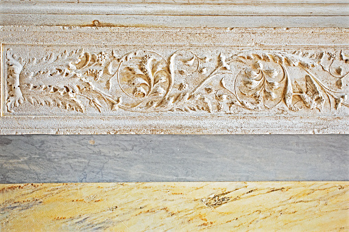 abstract background of decorative floral relief on the wall