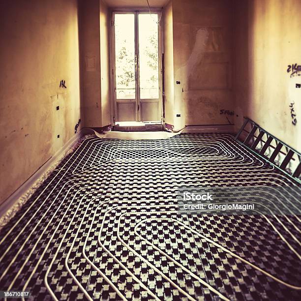 Underfloor Heating Home Improvement In Italian Apartment Stock Photo - Download Image Now
