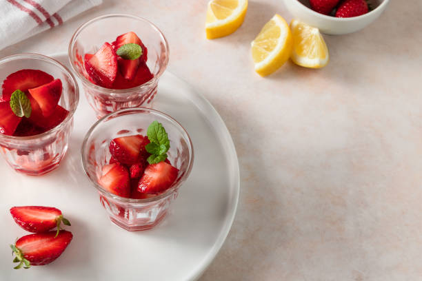istock Strawberry slices in glasses on the table view from above 1867113219