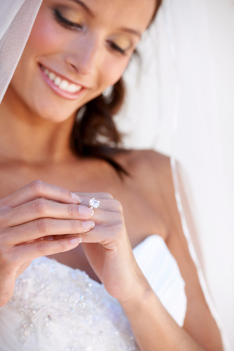 Closeup of a young bride wearing her wedding ring