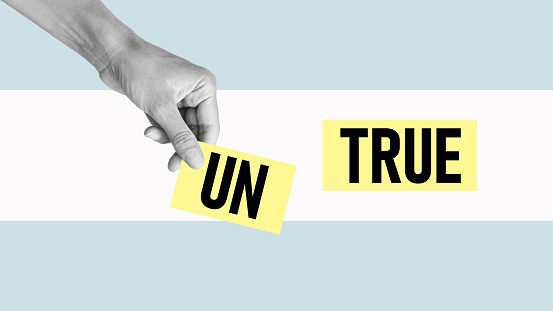 Dividing word untrue to letters un away in order to change the word to true. Post-truth and fakes. Lies in the fake news.