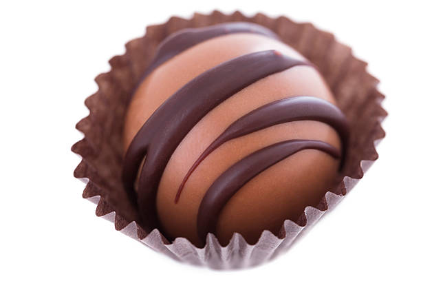 Valentines Day Chocolate Truffles Gift and Lighting Decorations on Retro Light Blue Wood Background