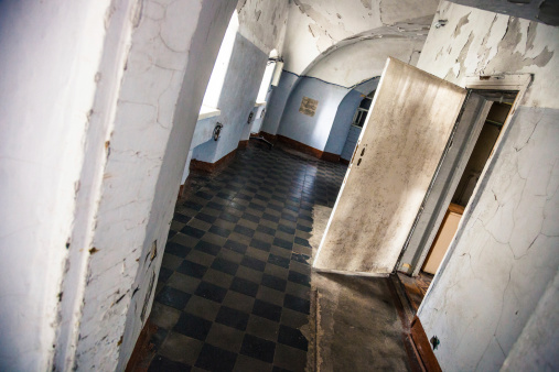 Corridor of an old abandoned madhouse in Tallinn, Estonia.