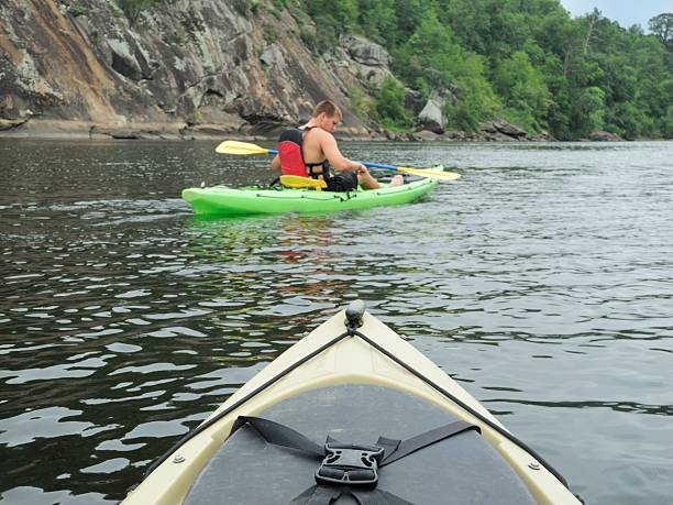 istock Looking over kayak bow at othr kayaker 186713697