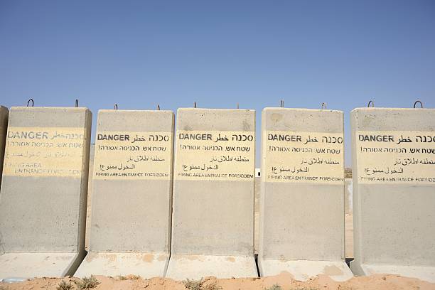 istock Warning messages on the protective concrete barriers 186714169
