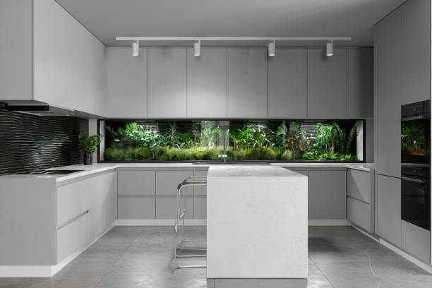 istock Modern Kitchen Interior With White Cabinets, Kitchen Island And Growing Plants In Bell-Jar 1867143455