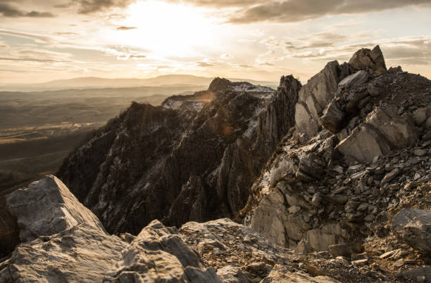 istock Beautiful view from the rocky mountain at sunset. Panorama. 1867151910
