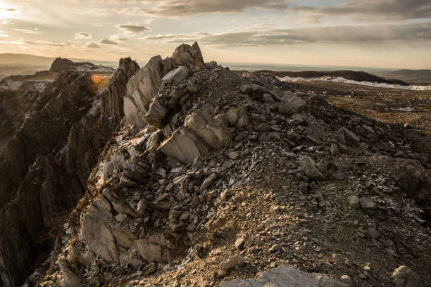 istock Beautiful view from the rocky mountain at sunset. Panorama. 1867153533