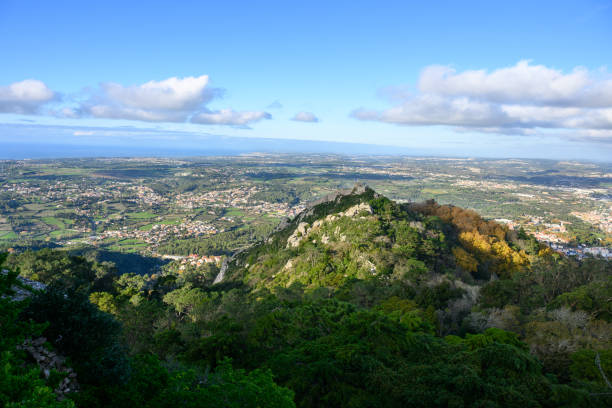 High angle view of Sintra mountains, or Serra de Sintra, of Portugal Sintra, Portugal - Nov 13, 2023: The cultural landscape of Sintra is classified as a UNESCO World Heritage Site. The mountains are home to a number of historic palaces, castles, such as the Castelo dos Mouros in the center of the picture. serra de sintra stock pictures, royalty-free photos & images