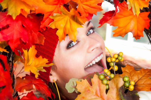 Happy young woman autumn portrait