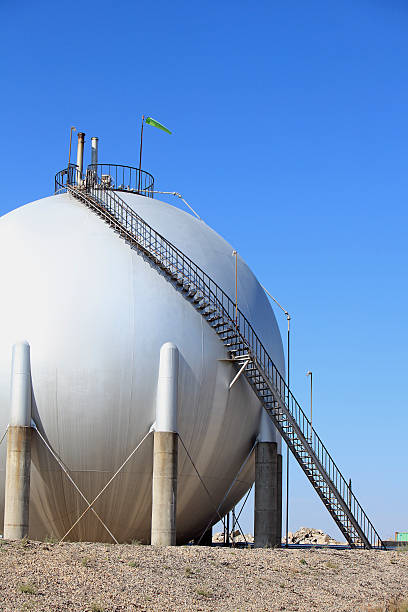 istock Large Silver Fuel Storage Tank At Refinery 186716561