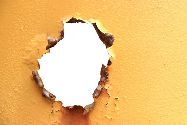 istock Old steel wall, damaged, rusty, dirty isolated on white background with clipping path. 1867174948