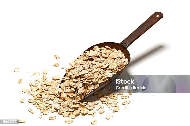 Scoop Of Oats Keep The Doctors Away Stock Photo - Download Image Now - Rolled Oats, Cut Out, Oats - Food