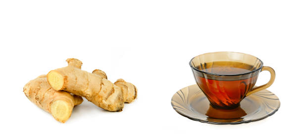 istock Ginger root and ginger tea in a cup isolated on a white. Collage. Wide photo. Free space for text. 1867182620