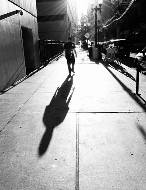 istock Man Walking in the Street.Black And White 186718824