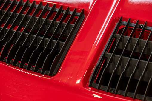 detail of a grille on the bodywork of an old car